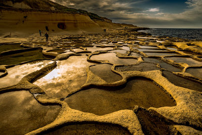 Tidal pools on rock formation at beach