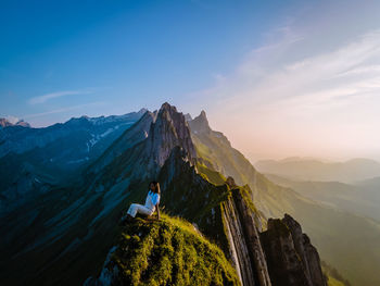 Panoramic view of snowcapped mountains against sky