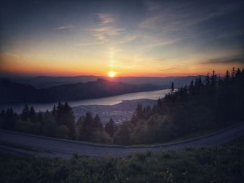 Scenic view of landscape against sky during sunset