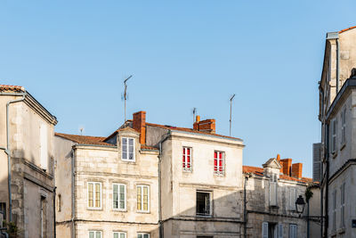 Decadent old residential buildings in the historic centre of la rochelle, france