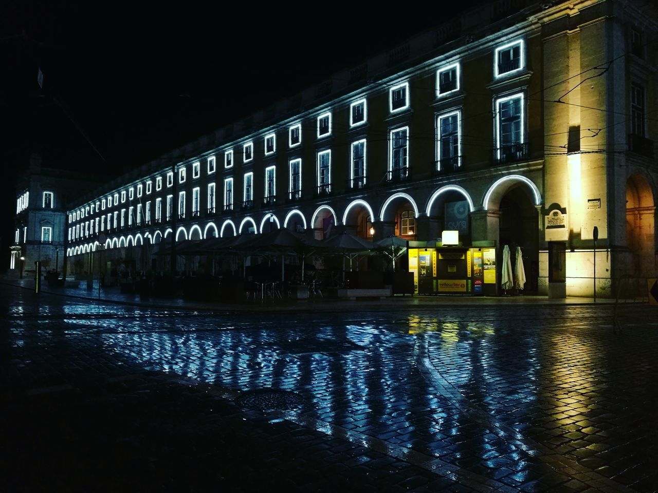 REFLECTION OF BUILDING IN WATER