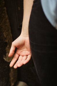 Midsection of woman gesturing