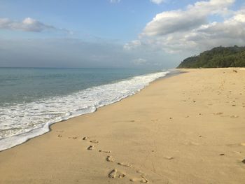 Scenic view of beach against sky