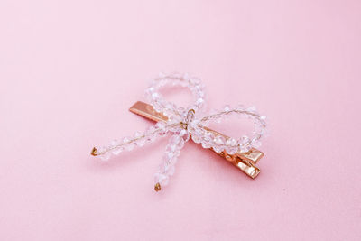 Close-up of pink petals against white background