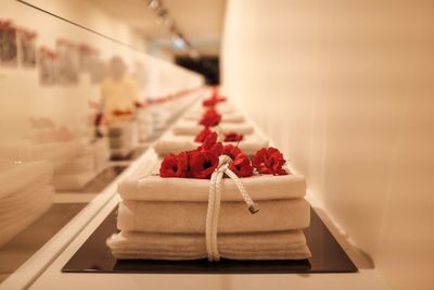 High angle view of textile with flower at memorial