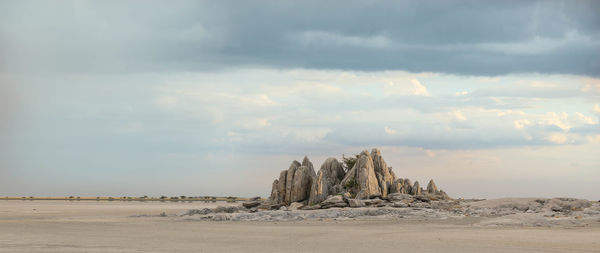 Scenic view of beach against sky