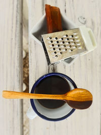 High angle view of black coffee on table