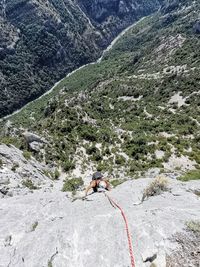 High angle view of person on rock against mountains, climbing gorges du verdon