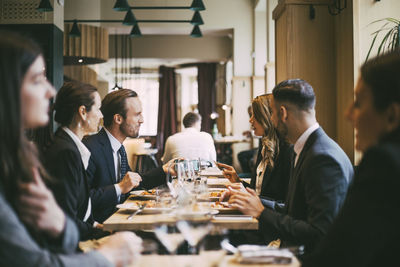 Business coworkers at lunch in restaurant