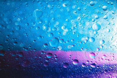 Close-up of raindrops on window