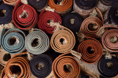 Full frame shot of various carpet at shop for sale