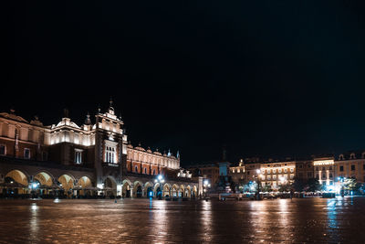 Illuminated buildings in city at night