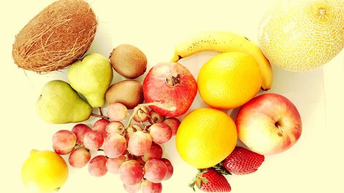 Close-up of fruits against white background