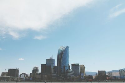 Low angle view of modern buildings against sky