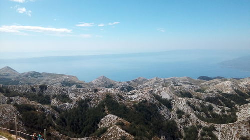 Panoramic view of trees and mountains against sky