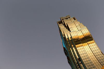 Low angle view of modern buildings against sky