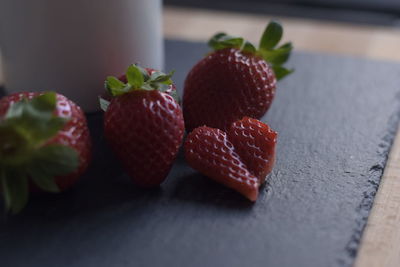 Close-up of chopped fruits on table