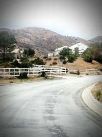 Road leading towards mountains