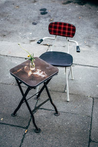 High angle view of stool and chair on street