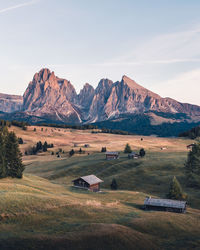 Scenic view of landscape and mountains against sky