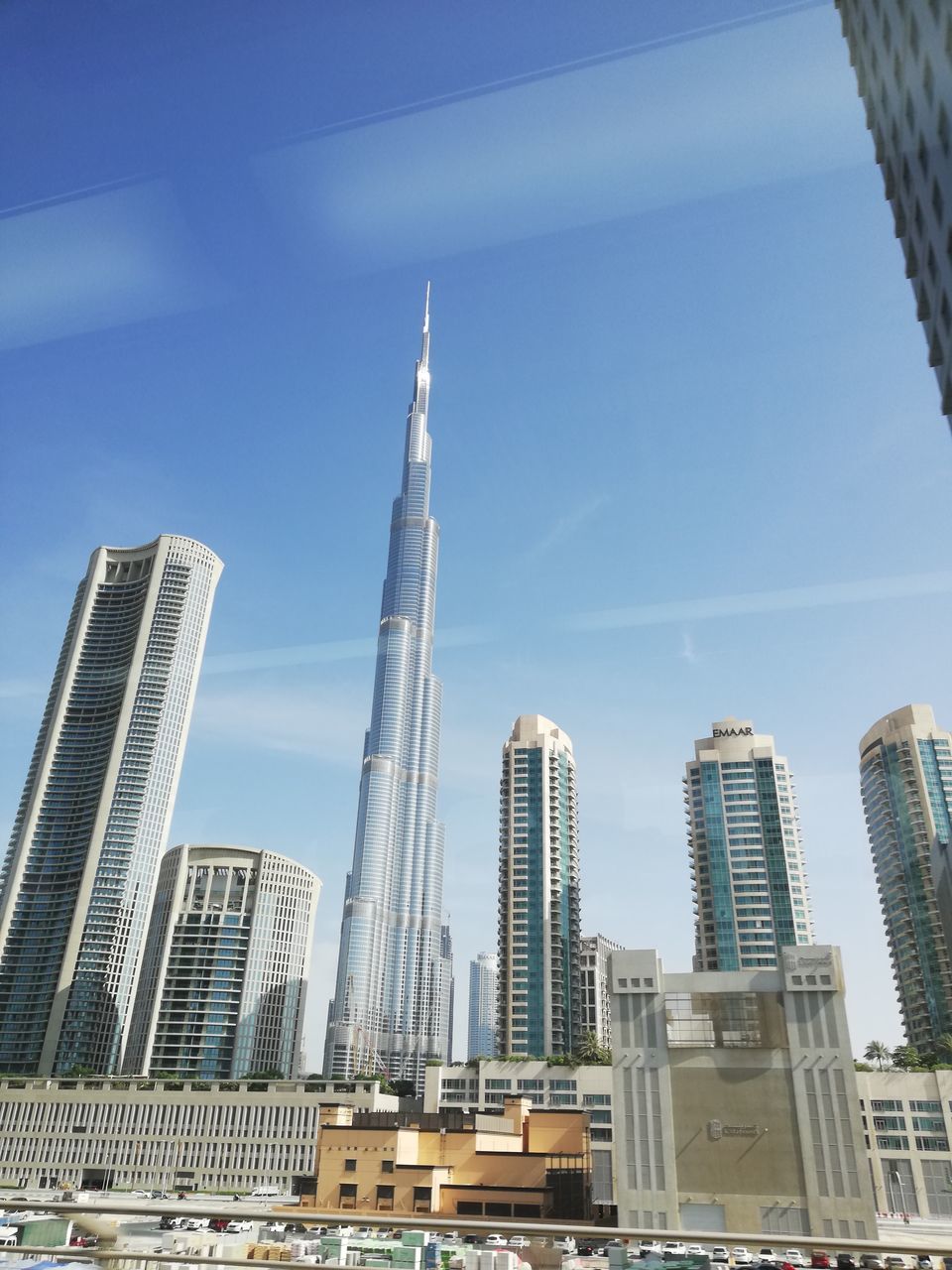 building exterior, built structure, architecture, building, office building exterior, skyscraper, sky, city, tall - high, tower, modern, office, no people, urban skyline, nature, day, landscape, low angle view, cityscape, residential district, financial district, outdoors, spire