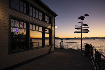 Pier on sea against clear sky