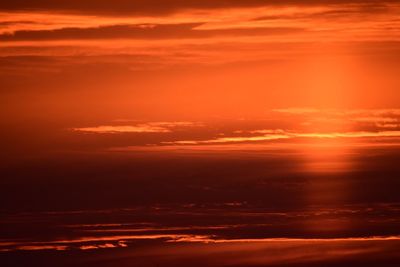 Scenic view of dramatic sky during sunset