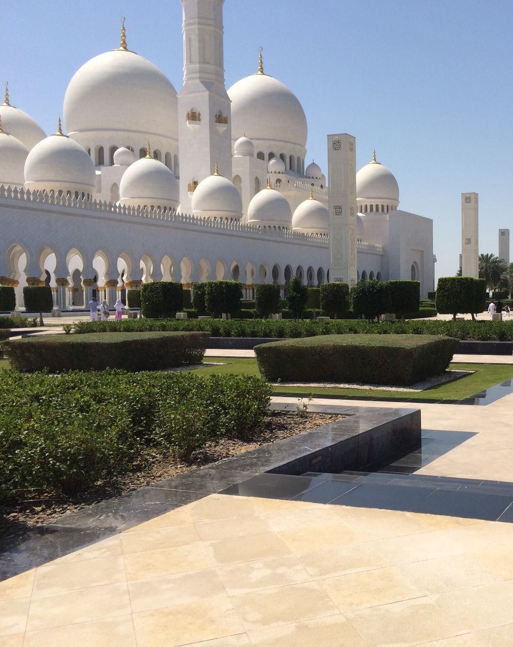 architecture, built structure, building exterior, dome, clear sky, famous place, travel destinations, mosque, islam, white color, place of worship, city, religion, tourism, travel, grass, day, church, international landmark