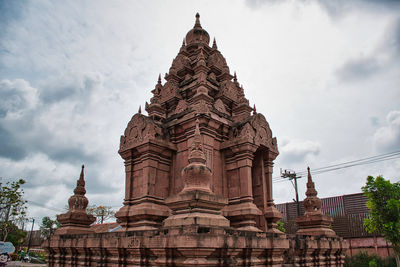 Low angle view of temple building against sky