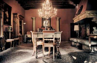 Empty chairs and tables in restaurant