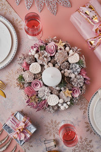 High angle view of pink roses on table