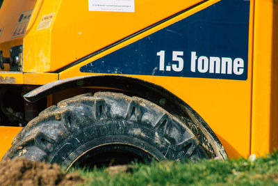 Close-up of information sign on car