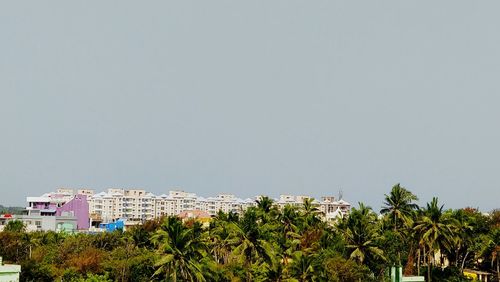 View of cityscape against clear sky