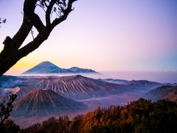 Scenic view of mountains against sky during sunset