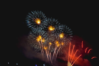 Firework display at night