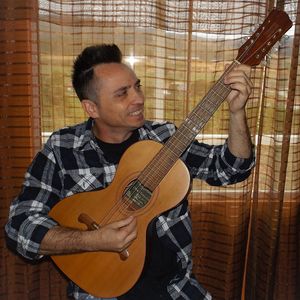 Mature man playing guitar