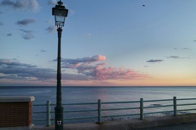 Scenic view of sea against sky at sunset