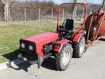 Abandoned tractor on field