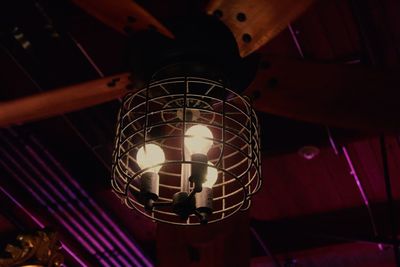 Low angle view of illuminated lighting equipment