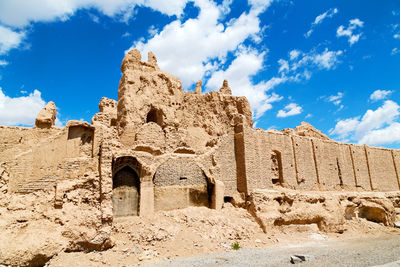 Low angle view of old ruins against sky