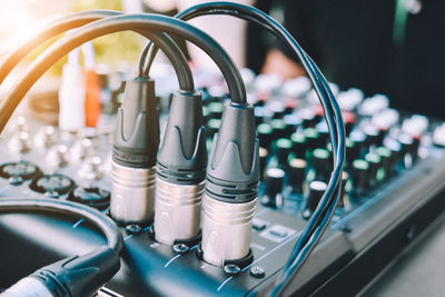 Close-up of sound mixer on table