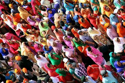 Full frame shot of people in traditional clothing at temple
