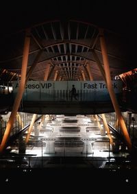Illuminated railroad station at night