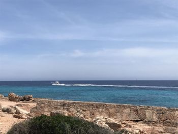 Scenic view of sea against sky in cala pi, spain