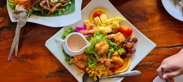 High angle view of food served on table