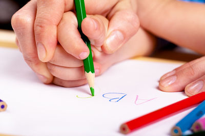Close-up of hand drawing on paper