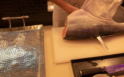 Close-up of person preparing food