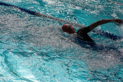 High angle view of person swimming in pool