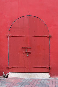 Closed door of red building