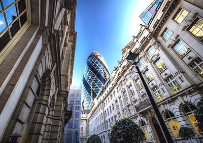 Low angle view of skyscrapers against sky